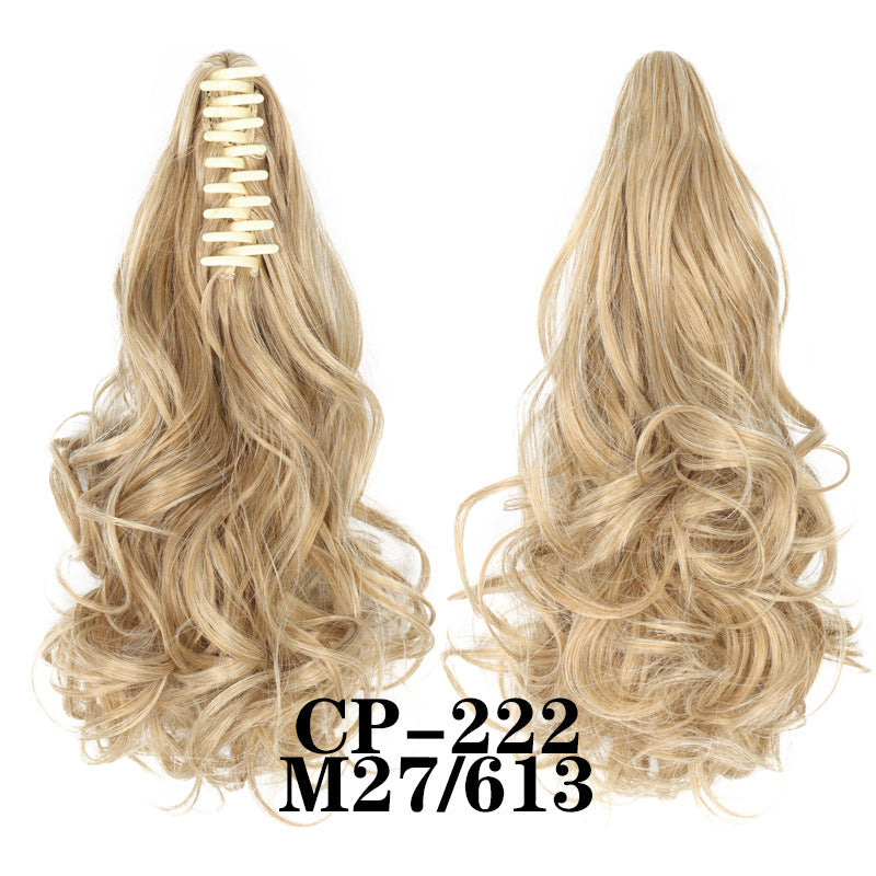 Wavy ponytail with curly hair and a tiger clip