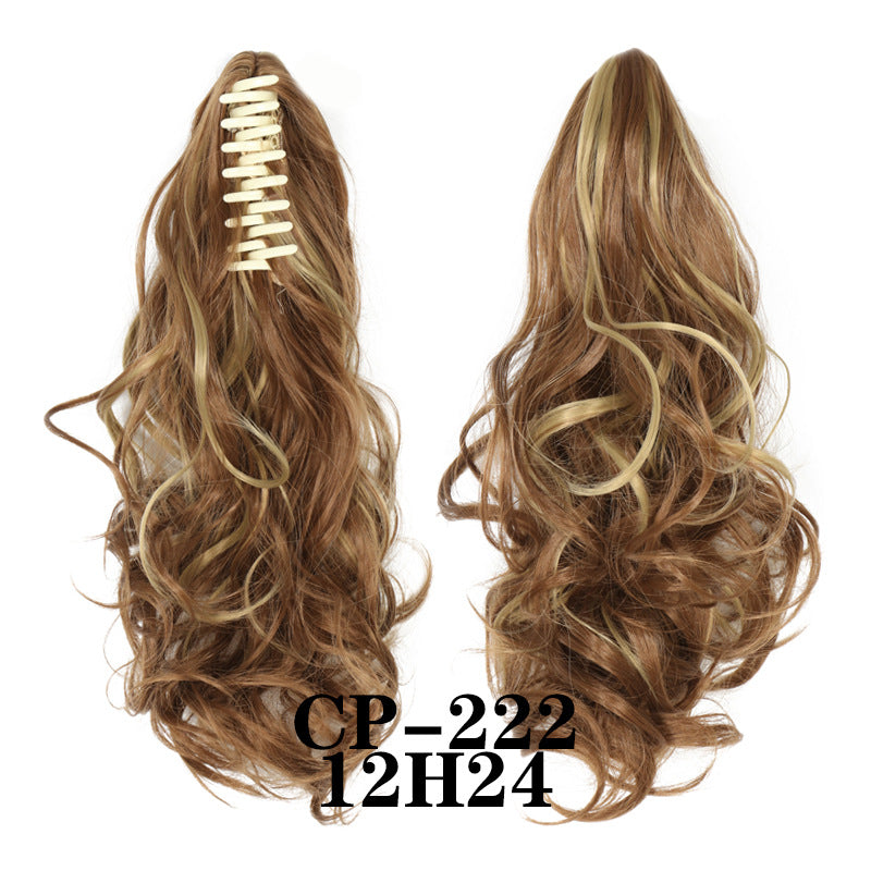 Wavy ponytail with curly hair and a tiger clip